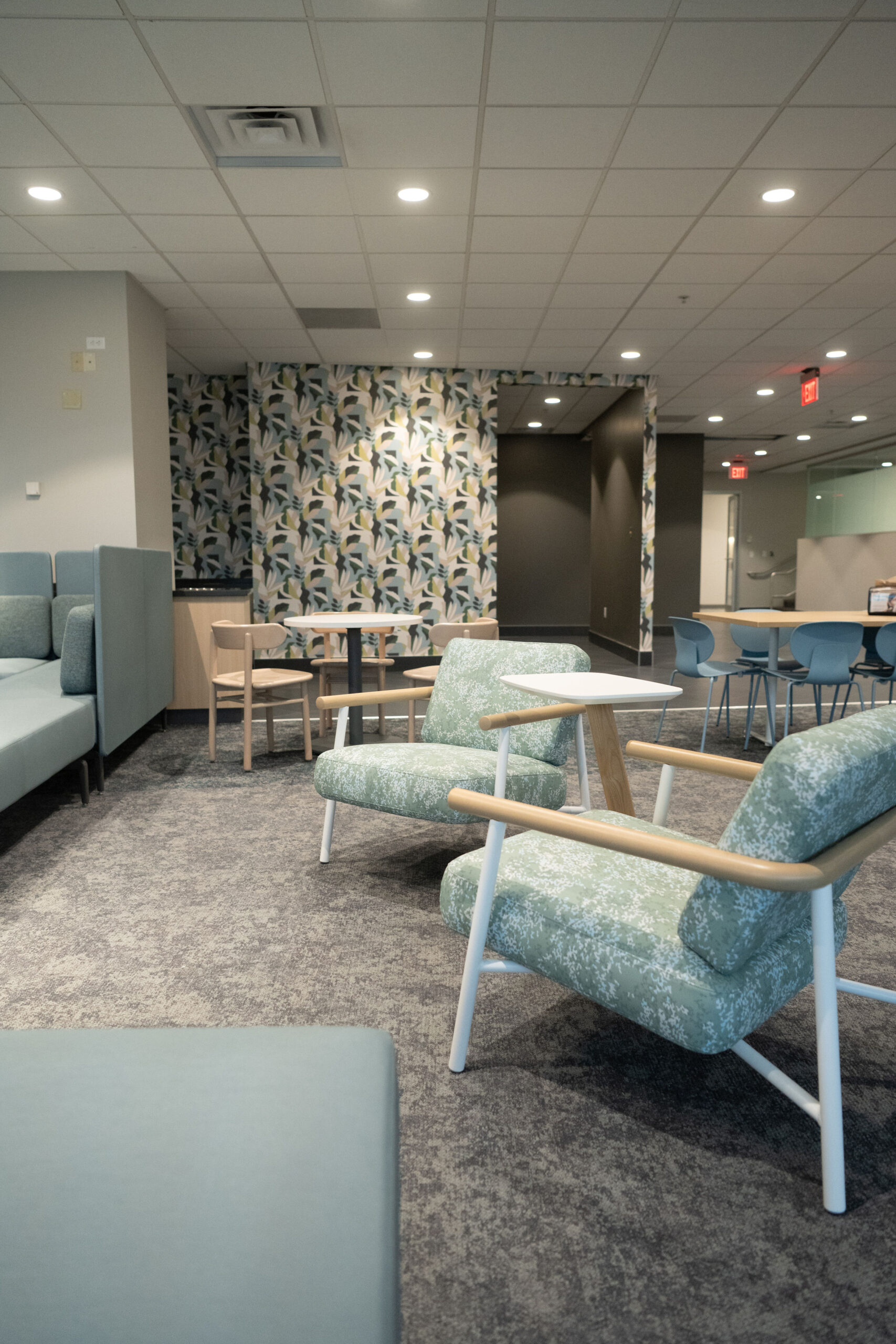 Modern lounge area with stylish chairs and muted decor.